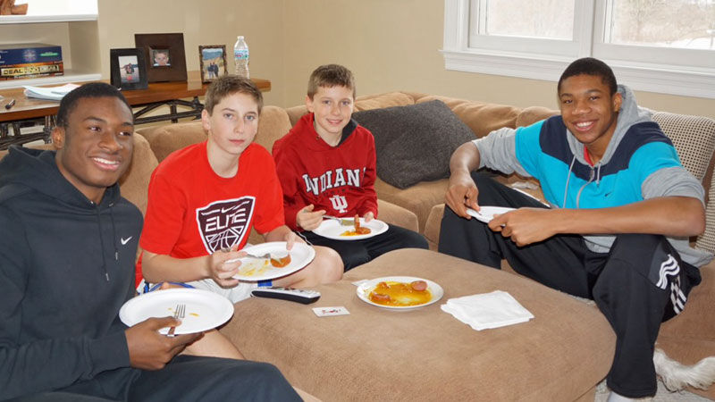 Robbie Morway with Giannis Antetokounmpo